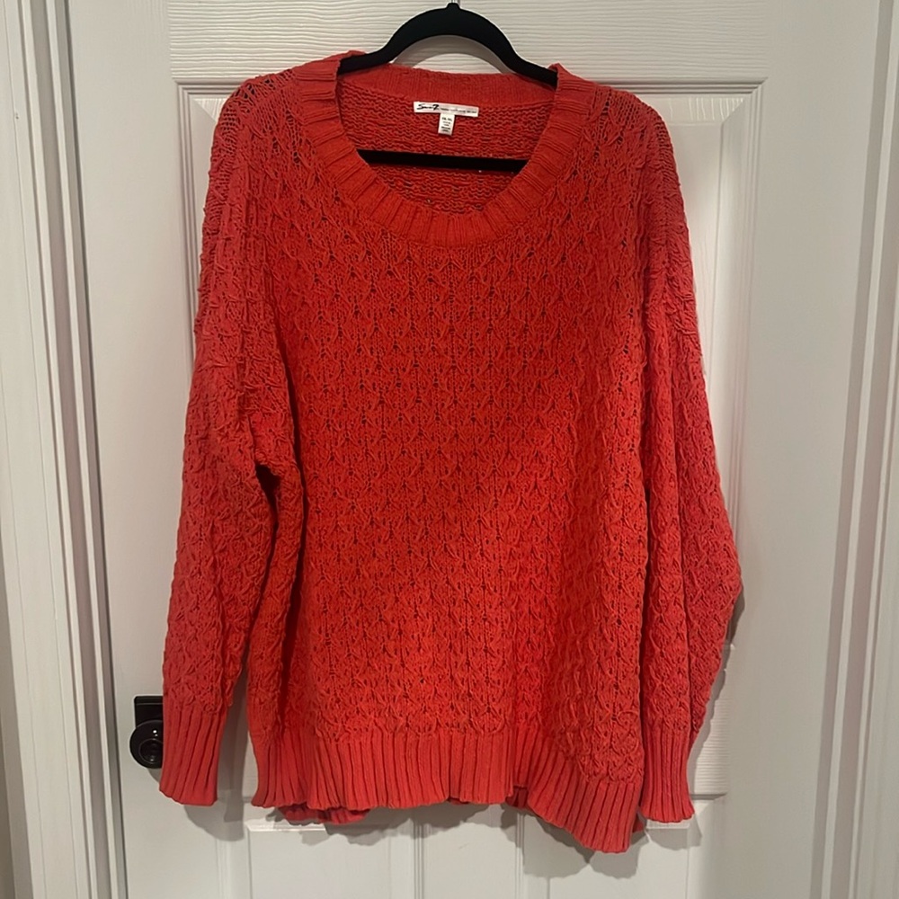 Pinkish orangey sweater